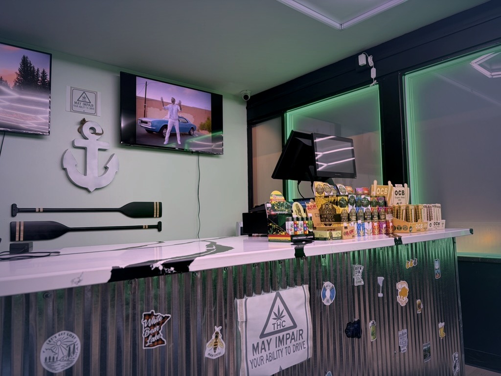 Front desk with anchor and oars wall art